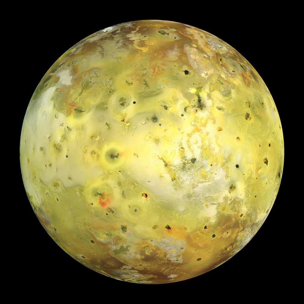Io, Jupiter’s volcanic moon, with bright yellows and dark lava plains.